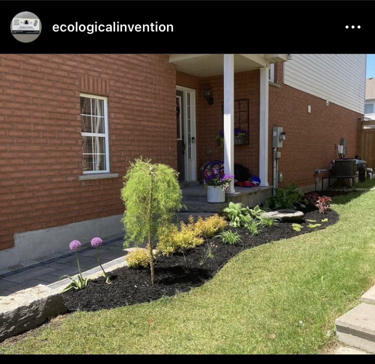 Planted front garden with natural stone edging by Ecological Invention